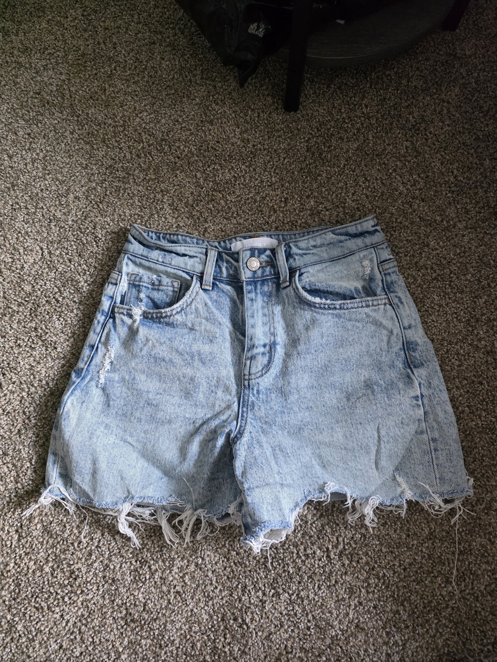 High-Rise Light Blue Distressed Denim Shorts